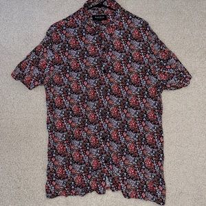 Floral button down shirt. Size L